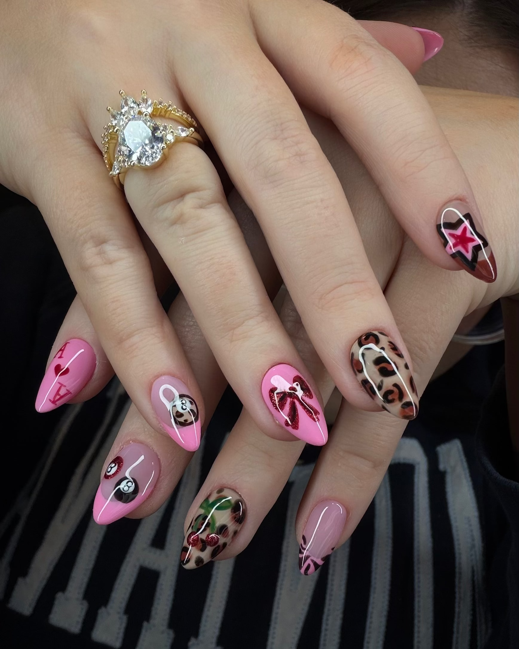 Mixed-art luxe set featuring leopard print, cherries, bows, stars, glossy pink tones, and hand-painted statement details